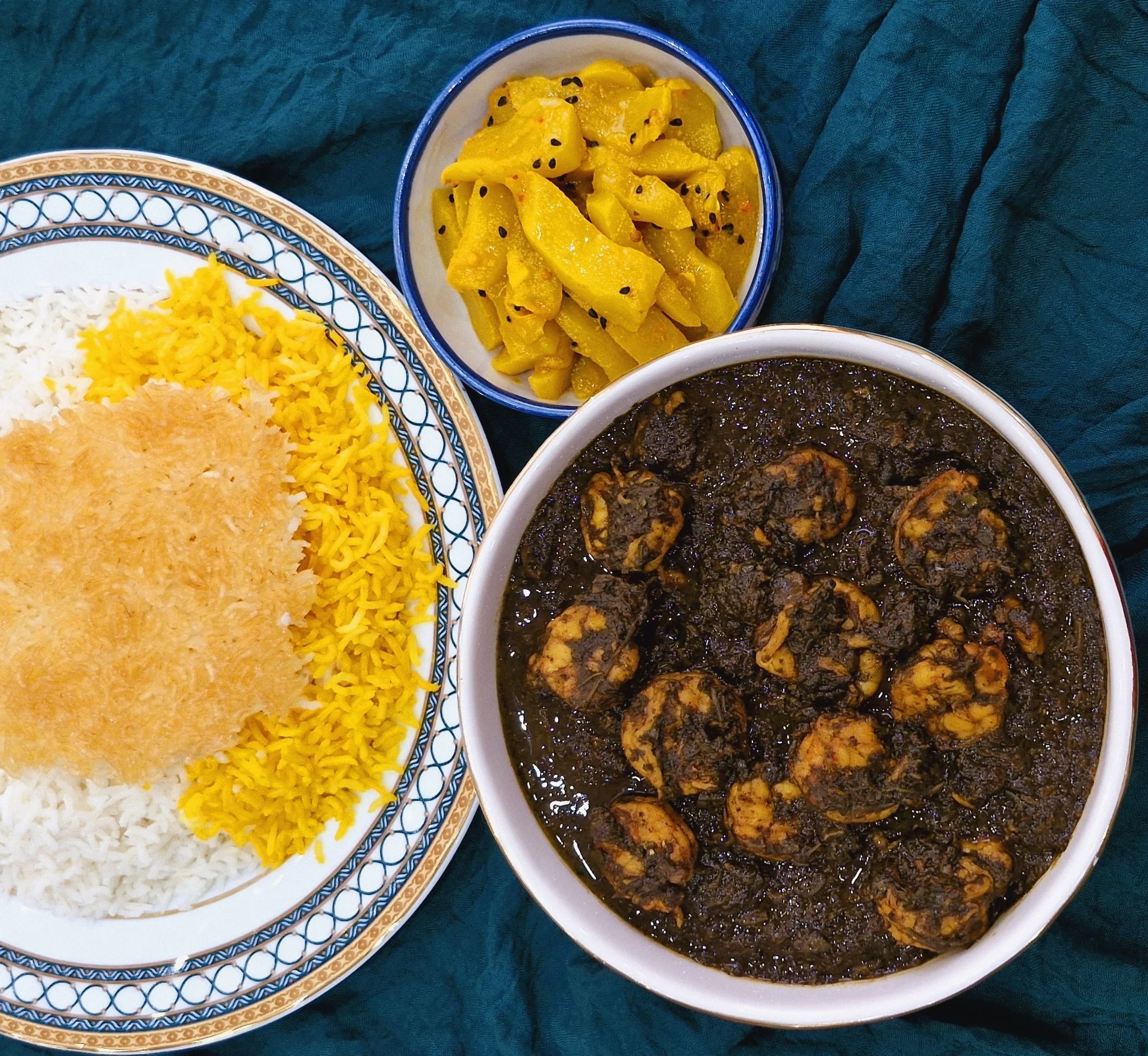 Serving Ghalieh Meygoo with Saffron Rice