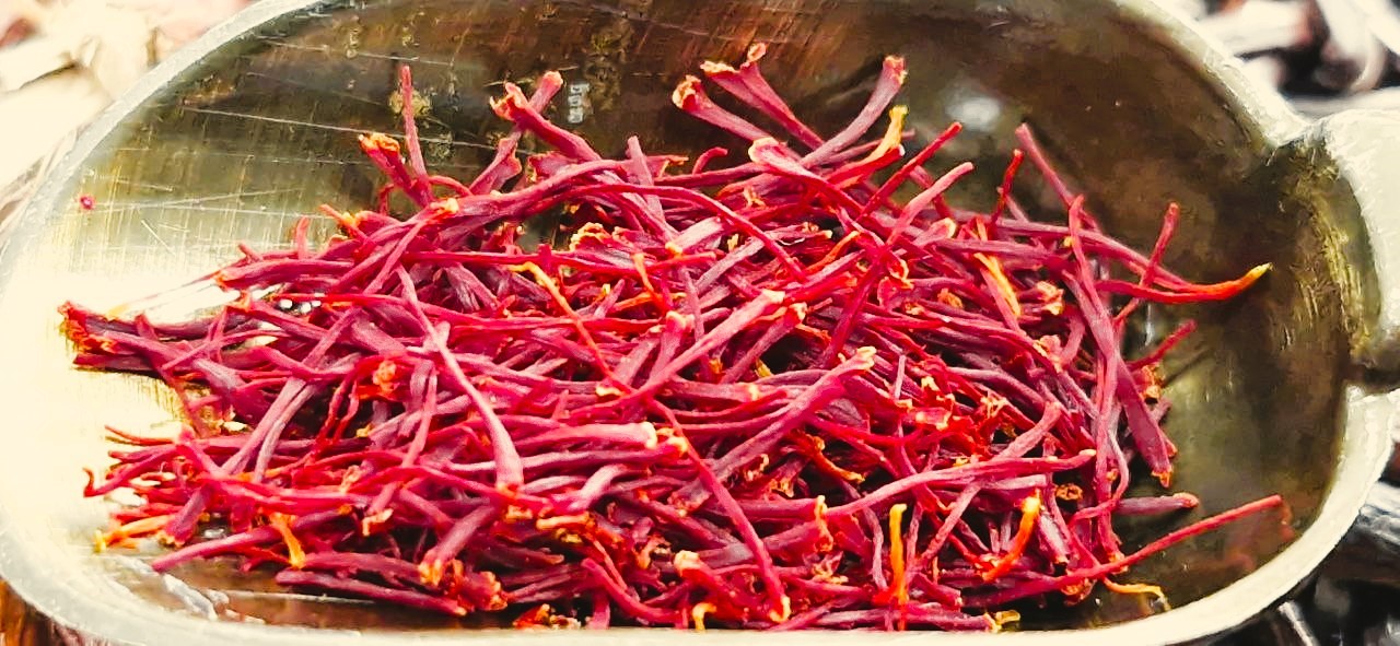 Pure Persian saffron threads showing deep red color and natural aroma