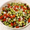 Shirazi Salad with chopped cucumber, tomatoes, onion, and dried mint