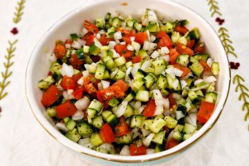 Shirazi Salad with chopped cucumber, tomatoes, onion, and dried mint
