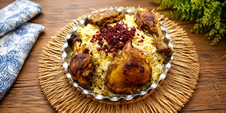 Zereshk Polo Ba Morgh with saffron rice and barberries