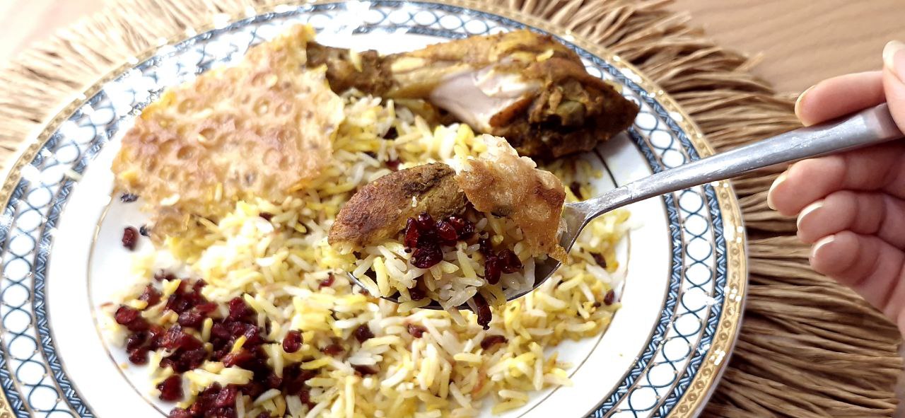 Zereshk Polo Ba Morgh Serving Zereshk Polo Ba Morgh served with barberry rice and chicken